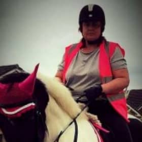 Michelle Hanney pictured riding a horse. (DWP/SWNS)