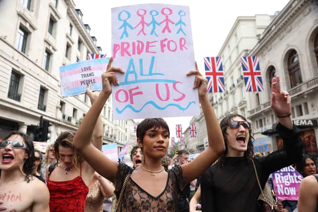 Yasmin Finney holds a placard during London Trans+ Pride 2023. Image: Hollie Adams/Getty Images