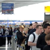 Passengers flying out of London Heathrow airport are more likely to have their flights cancelled than in any other UK airport. (Photo by Daniel LEAL / AFP) 