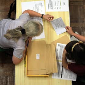 Pupils open their exam results. Credit: Matt Cardy/Getty Images