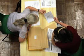 Pupils open their exam results. Credit: Matt Cardy/Getty Images