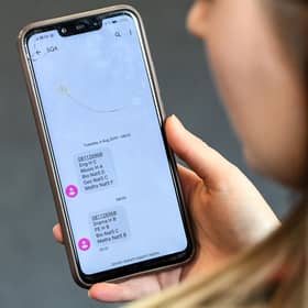 A pupil receiving a text message with their exam results. Image: Andy Buchanan/Getty Images