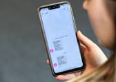 A pupil receiving a text message with their exam results. Image: Andy Buchanan/Getty Images
