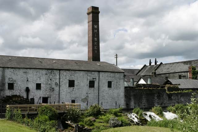 Pictured above is an Irish distillery. If you pay close attention to the chimney, you will see that the beverage is listed as “whiskey” with the letter e included; there’s a historical reason for this.