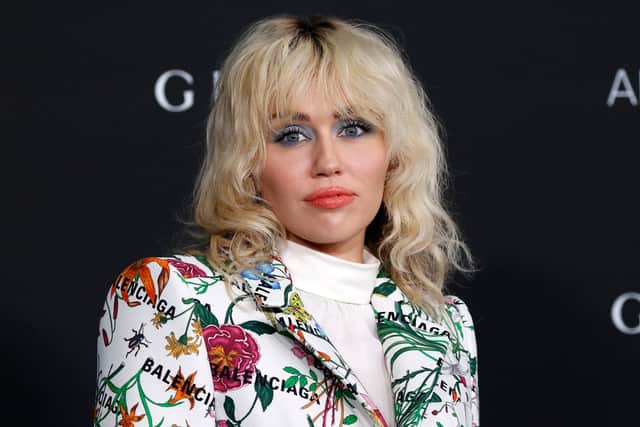 Miley Cyrus is one artist you can create a Blend playlist with on Spotify. Image: Getty 