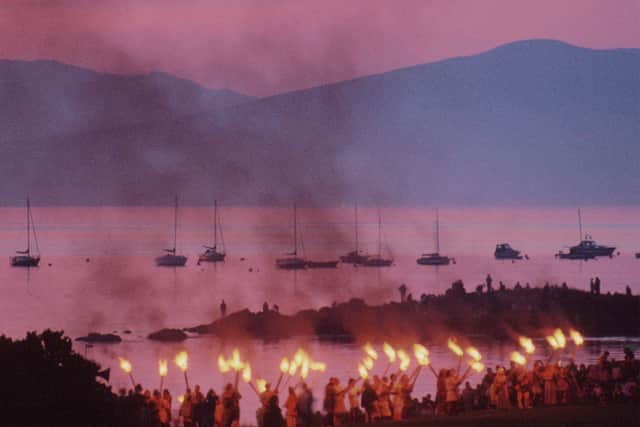 Submitted by SoopySue from Getty Images Signature: “A Viking re-enactment in Largs begins with a torchlight procession just after sundown. This is part of the Viking festival which commemorates the Battle of Largs in 1263. The Firth of Clyde and the Island of Great Cumbrae are in the background.”