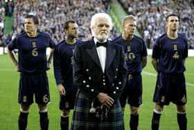 Ronnie Brown, of the Corries sings prior to the game (Scotland v Canada - Pittodrie Stadium). 