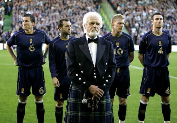 Ronnie Brown, of the Corries sings prior to the game (Scotland v Canada - Pittodrie Stadium). 