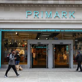 A pedestrian walks past a Primark store on Oxford Street, London.