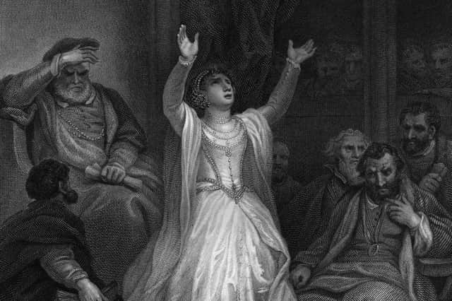May 1536, English queen Anne Boleyn (1507 - 1536), second wife of King Henry VIII, raises her arms in despair on being sentenced to death for high treason at the Tower of London. Image: Hulton Archive/Getty Images