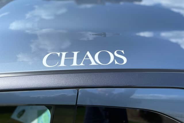 The words 'Chaos' and 'Balance' are displayed on the roof of the Aygo X, for some reason