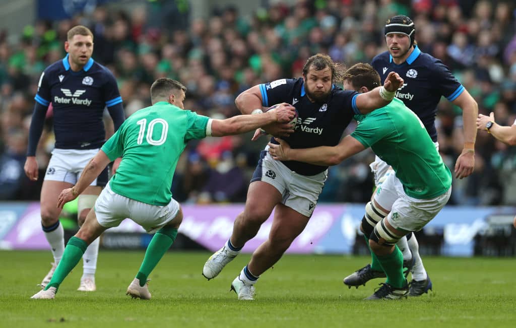Pierre Schoeman of Scotland goes past Johnny Sexton during the Six Nations Rugby match between Scotland and Ireland at Murrayfield Stadium on March 12, 2023 - the last time the two teams played each other before the Rugby World Cup.