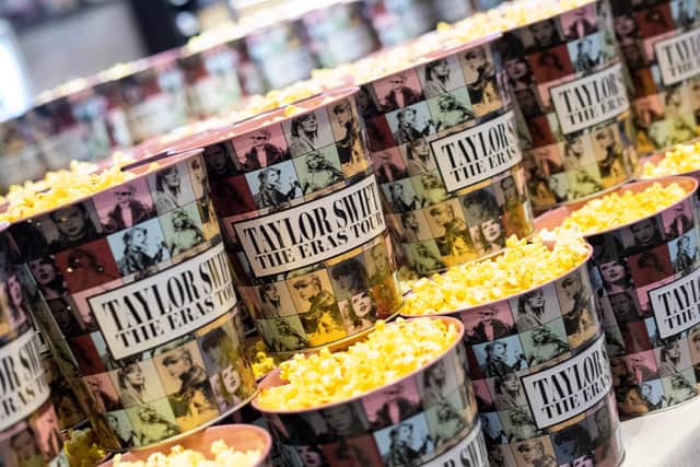 Popcorn buckets are pictured during the "Taylor Swift: The Eras Tour" concert movie world premiere. Image: Getty