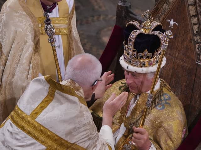 King Charles III during his coronation ceremony in Westminster Abbey.