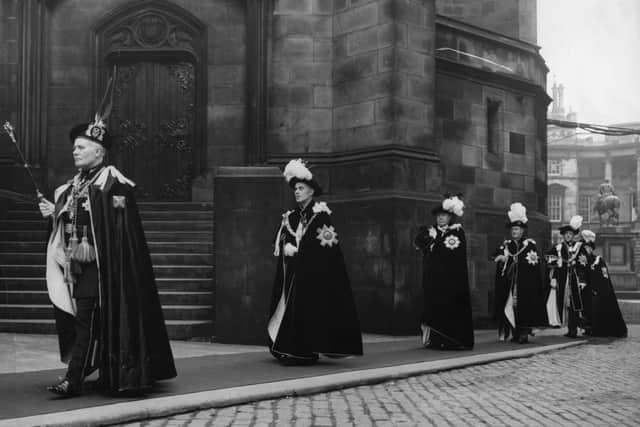 Knights of the Thistle arriving at St. Giles' Cathedral, Edinburgh for the Scottish National Service of Thanksgiving and Dedication. The Crown of the Scottish Crown Jewels went on procession for the first time since 1822.