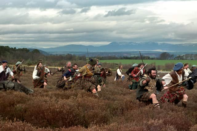 Modern-day clansmen re-enact their forefathers' last stand  to mark the 250th anniversary of the Battle of Culloden in the Scottish Highlands. The battle, the last to be held on the British mainland, claimed the lives of 2,000 Highlanders who fell to Government forces. (1996) 