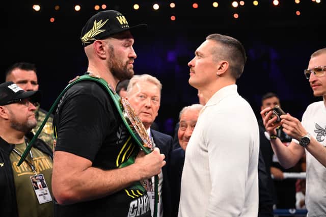 Tyson Fury and Oleksandr Usyk face off after the Heavyweight fight between Fury and Francis Ngannou.