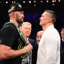 Tyson Fury and Oleksandr Usyk face off after the Heavyweight fight between Fury and Francis Ngannou.