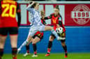 Fiona Brown battles for the ball against Belgium. Cr. Getty Images.