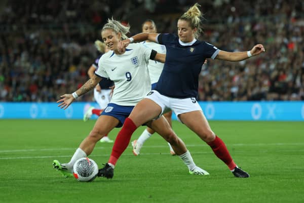 Sophie Howard tackles Rachel Daly during the side's clash back in September. Cr. Getty Images.