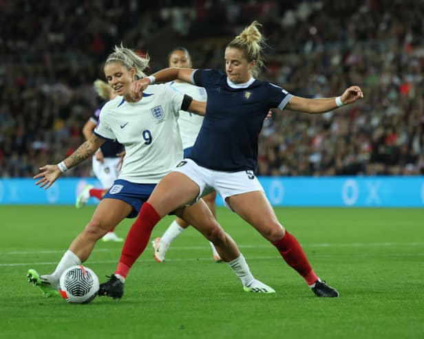 Sophie Howard tackles Rachel Daly during the side's clash back in September. Cr. Getty Images.