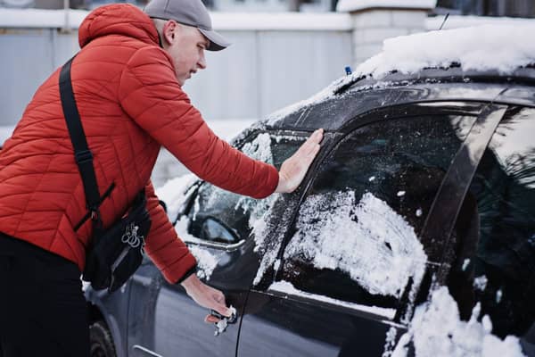 A frozen car door can be a tricky business.