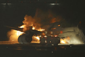 A Japan Airlines plane is on fire on the runway of Tokyo’s Haneda airport on Tuesday, Jan. 2, 2024 in Tokyo, Japan. (Kyodo News via AP)
