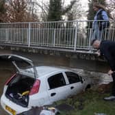 Liam Stych and Tia Draper rescuers who saved a woman and her child from a submerged car on Green Lane, in Hall Green, Birmingham. Picture: Anita Maric / SWNS