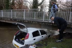 Liam Stych and Tia Draper rescuers who saved a woman and her child from a submerged car on Green Lane, in Hall Green, Birmingham. Picture: Anita Maric / SWNS