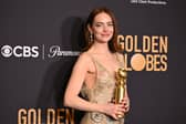 Emma Stone with Golden Globe award for Best Actress. Cr. Getty Images.