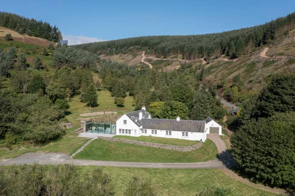 What is it? Once a humble rustic shepherd’s cottage, Blackhouse has been radically renovated to present a spectacular seven-bedroom family home with a striking glass atrium boasting splendid views across the Yarrow Valley countryside. 