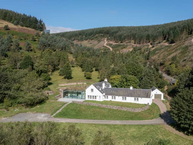 What is it? Once a humble rustic shepherd’s cottage, Blackhouse has been radically renovated to present a spectacular seven-bedroom family home with a striking glass atrium boasting splendid views across the Yarrow Valley countryside. 