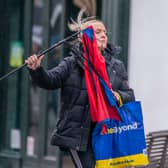 A woman with a broken umbrella in windy conditions in Leeds. The UK is blanketed by "unusual" danger-to-life wind warnings ahead of Storm Isha, with people warned not to travel amid possible 90mph gusts.