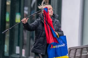 A woman with a broken umbrella in windy conditions in Leeds. The UK is blanketed by "unusual" danger-to-life wind warnings ahead of Storm Isha, with people warned not to travel amid possible 90mph gusts.