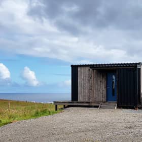 The Bothan occupies a stunning location overlooking the Atlantic Ocean.