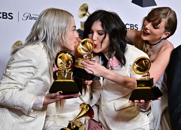 Taylor Swift and boygenius with their Grammys.