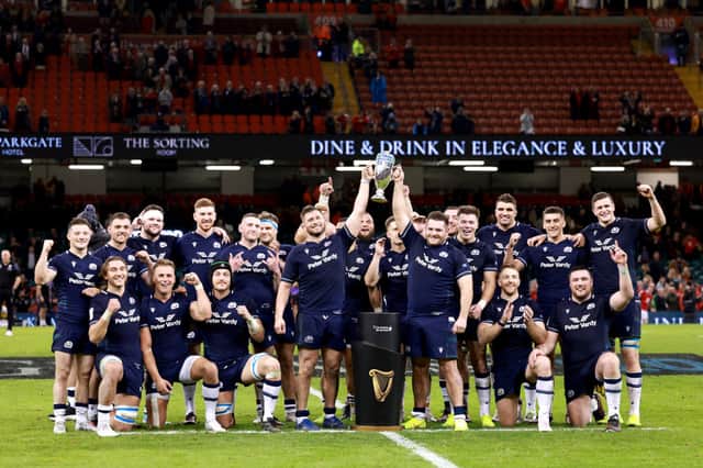 Scotland lift the Doddie Weir Cup trophy after their victory over Wales on the first weekend of the Six Nations 2024.
