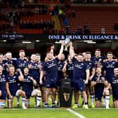 Scotland lift the Doddie Weir Cup trophy after their victory over Wales on the first weekend of the Six Nations 2024.