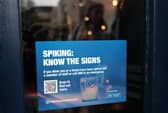 Drink spiking notice in a pub window (Photo: Yui Mok/PA Wire)