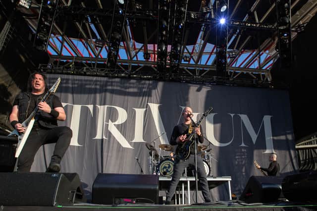 Corey Beaulieu, Paolo Francesco, Alex Bent, and Paolo Gregoletto of Trivium perform on stage. Image: Getty