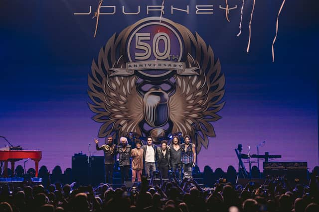 Journey is seen on stage during their 50th Anniversary Tour. Image: Getty