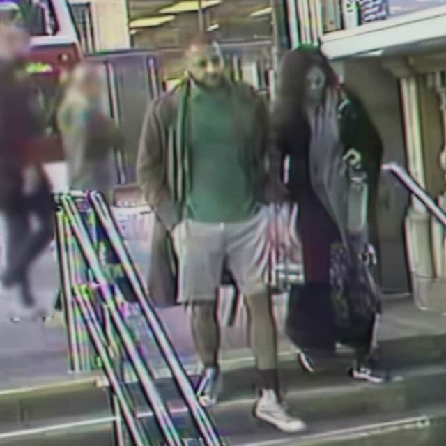 Kashif Anwar and Fawziyah Javed captured by CCTV at Waverley Steps on their way to Arthur's Seat.