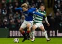 Celtic and Rangers are wrestling for the league title - but who pays the most for their players? Cr. SNS Group