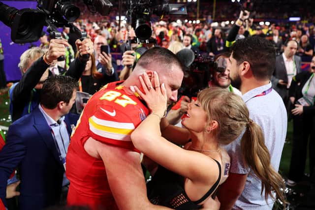 Travis Kelce #87 of the Kansas City Chiefs and Taylor Swift embrace after defeating the San Francisco 49ers 25-22 in overtime during Super Bowl LVIII at Allegiant Stadium on February 11, 2024 in Las Vegas, Nevada. (Photo by Ezra Shaw/Getty Images)