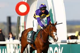 Derek Fox rides Corach Rambler to victory in the 2023 Grand National.