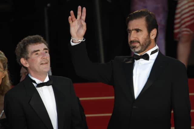 Eric Cantona alongside his Looking For Eric co-star Steve Evets at Cannes Film Festival in 2009.