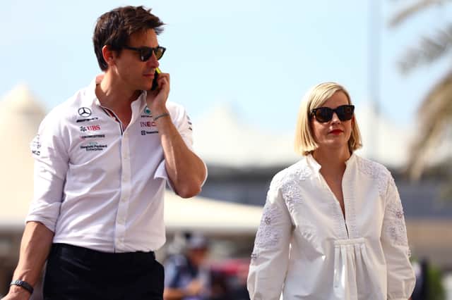 Toto Wolff and Susie Wolff walking together during the 2022 F1 season. 