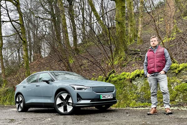 Steven Chisholm with his Polestar 2 test car near Bridge of Weir. Credit National World