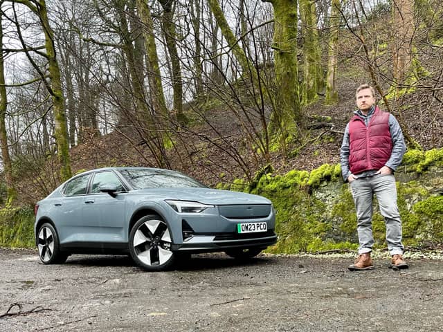 Steven Chisholm with his Polestar 2 test car near Bridge of Weir. Credit National World
