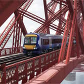 A virtual train crossing a virtual Forth Bridge.